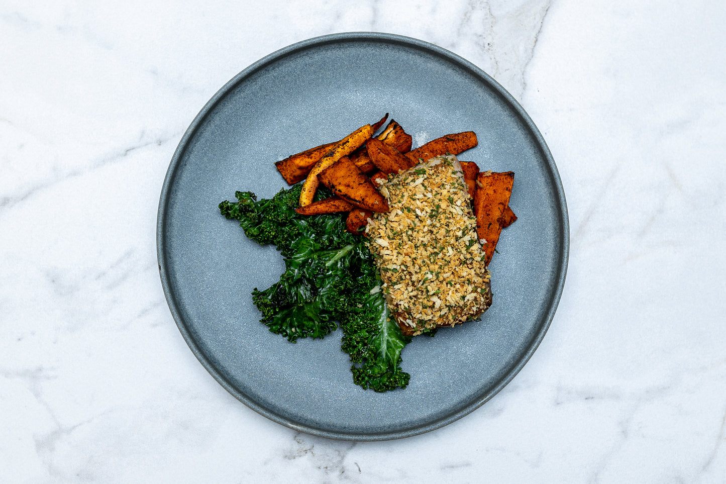 Herb Crusted Mahi Mahi with Spicy Sweet Potato Wedges and Kale