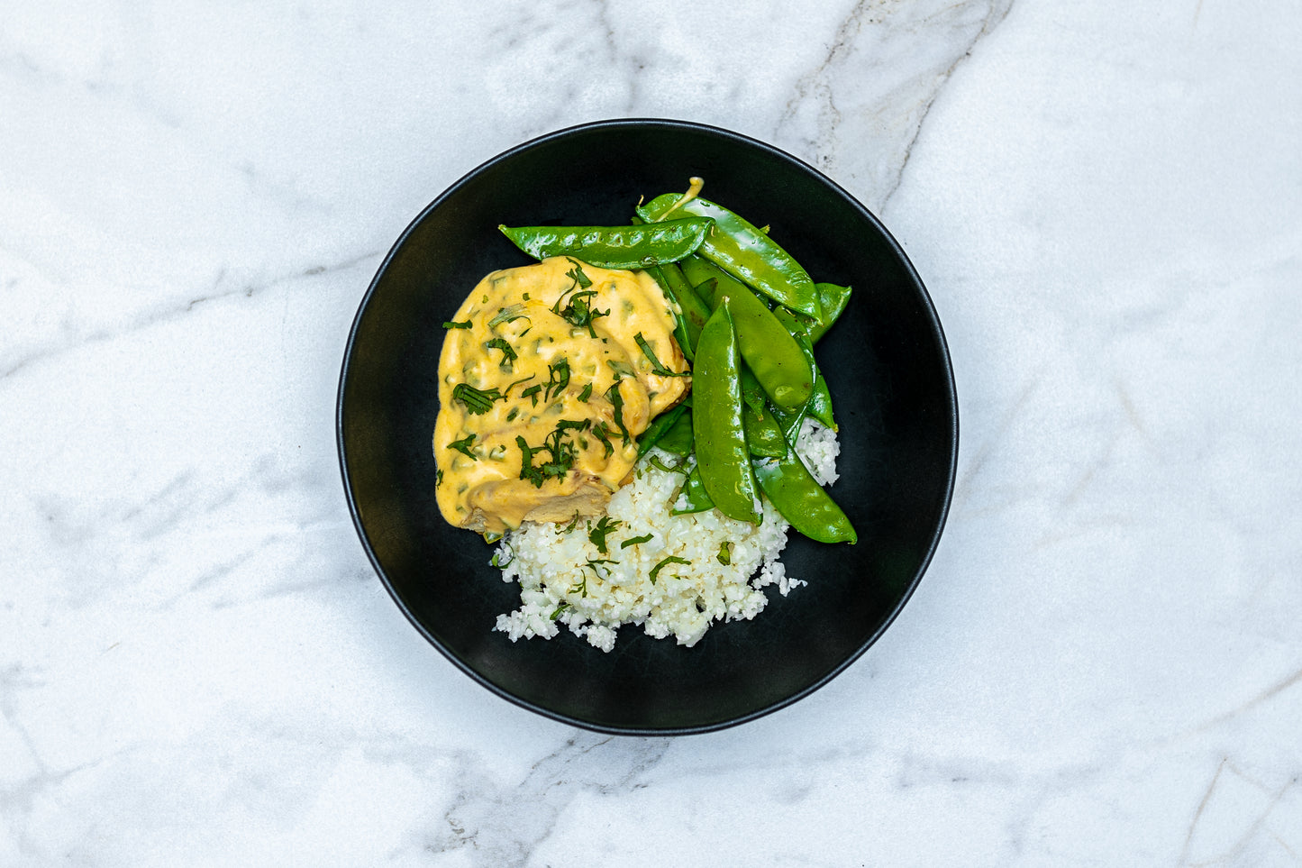 Jalapeno Cheddar Chicken with Cauliflower Rice and Sauteed Peas