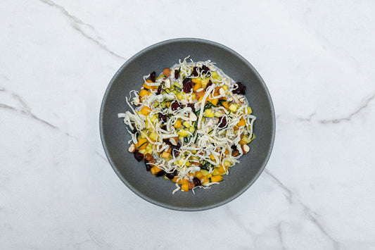 Chia Overnight Oats Topped with Coconut, Pina, and Cranberry